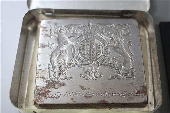 A cut steel seal matrix with the Royal Coat of Arms and engraved by appointment to HM The Queen, 6.5 x 7cm, with makers plaque of Sel